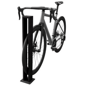 Antraciet stalen fietsenrek met modern design, geschikt voor enkel fiets parkeren.
