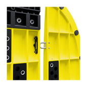 Gele kunststof sleufbrug koppelsysteem met zwarte tussen- en eindstukken, detail van de verbinding.